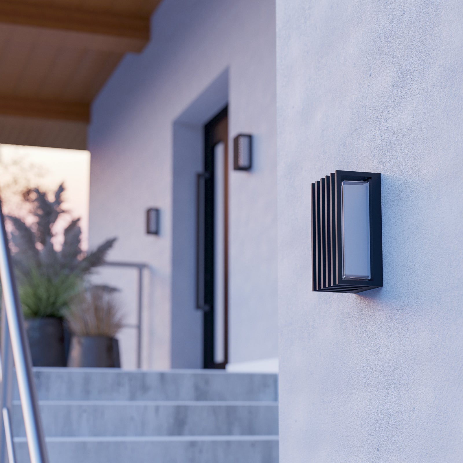 LED utevegglampe Genovese med bevegelsessensor svart IP65 - EGLO