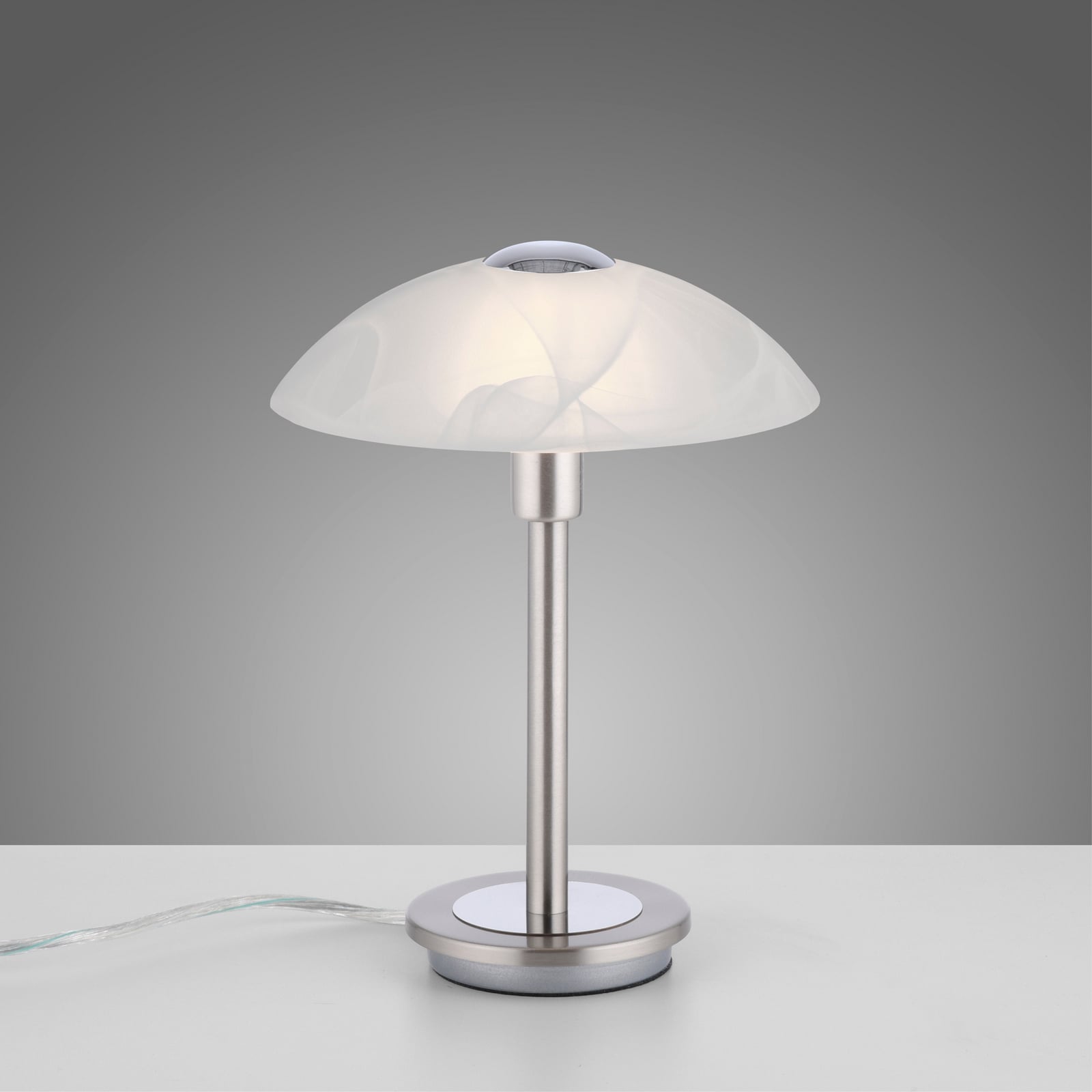 Nærbilde av opalglass på bordlampe Enova