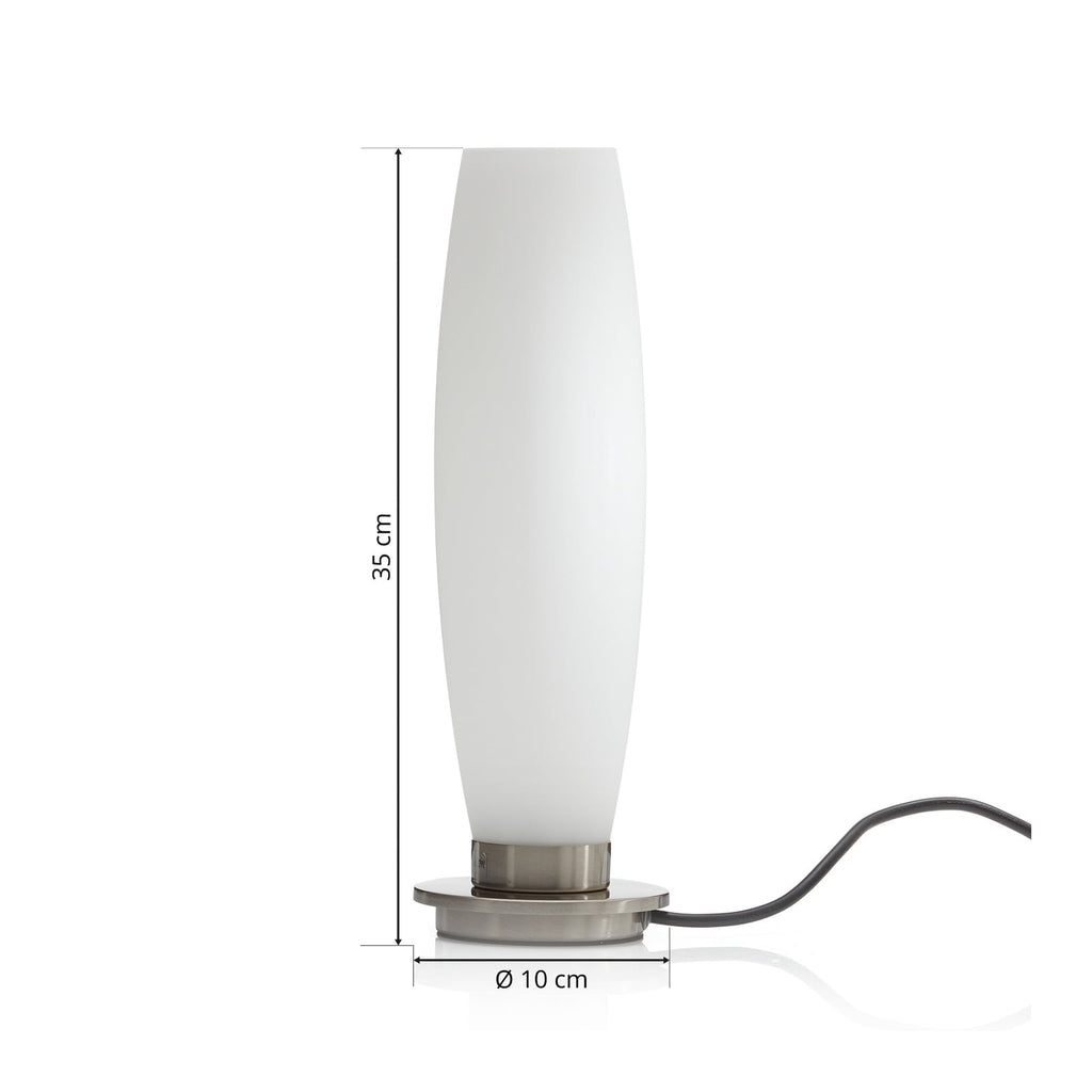 Bordlampe Tyra glass dimbar G9 i bruk på nattbord