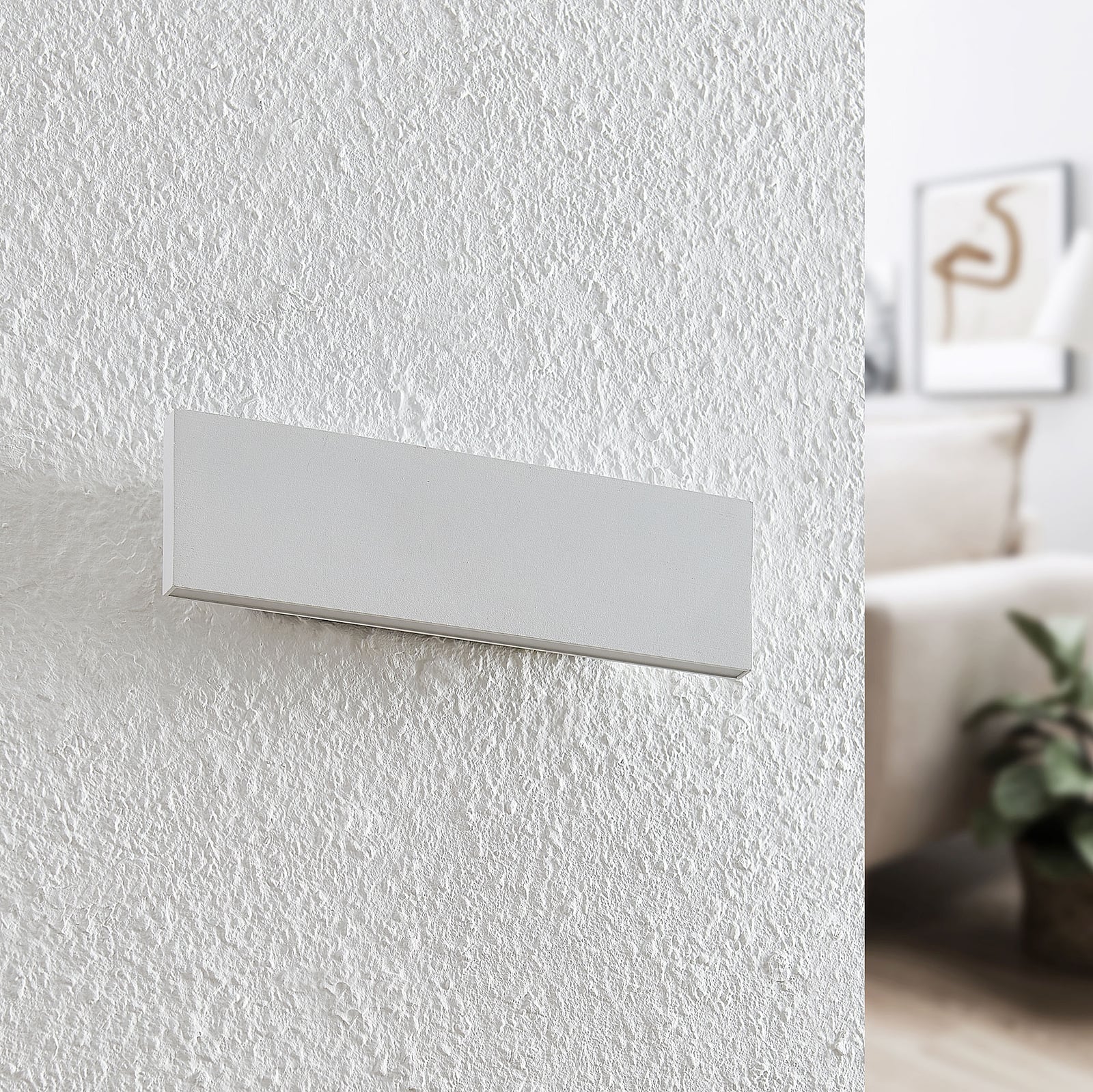 Detalj av LED vegglampe Ignazia opp og ned hvit 28 cm