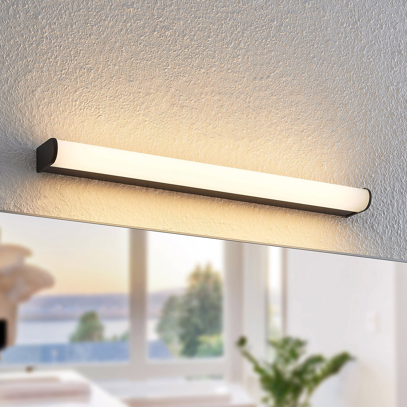 LED baderomslampe Ulisan rund svart 58,8 cm IP44 varmhvit forfra