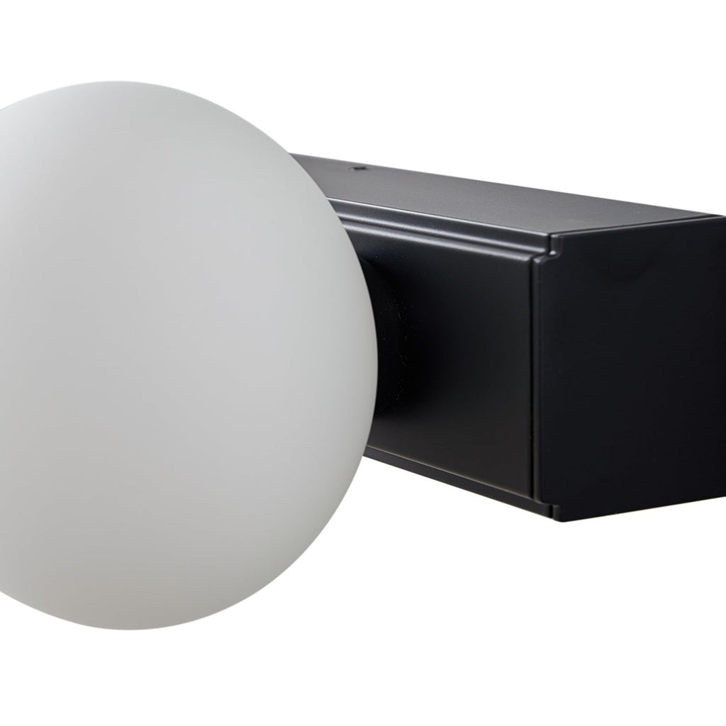 LED baderomsvegglampe Myrra 4-lys glass svart 60 cm lysdetalj