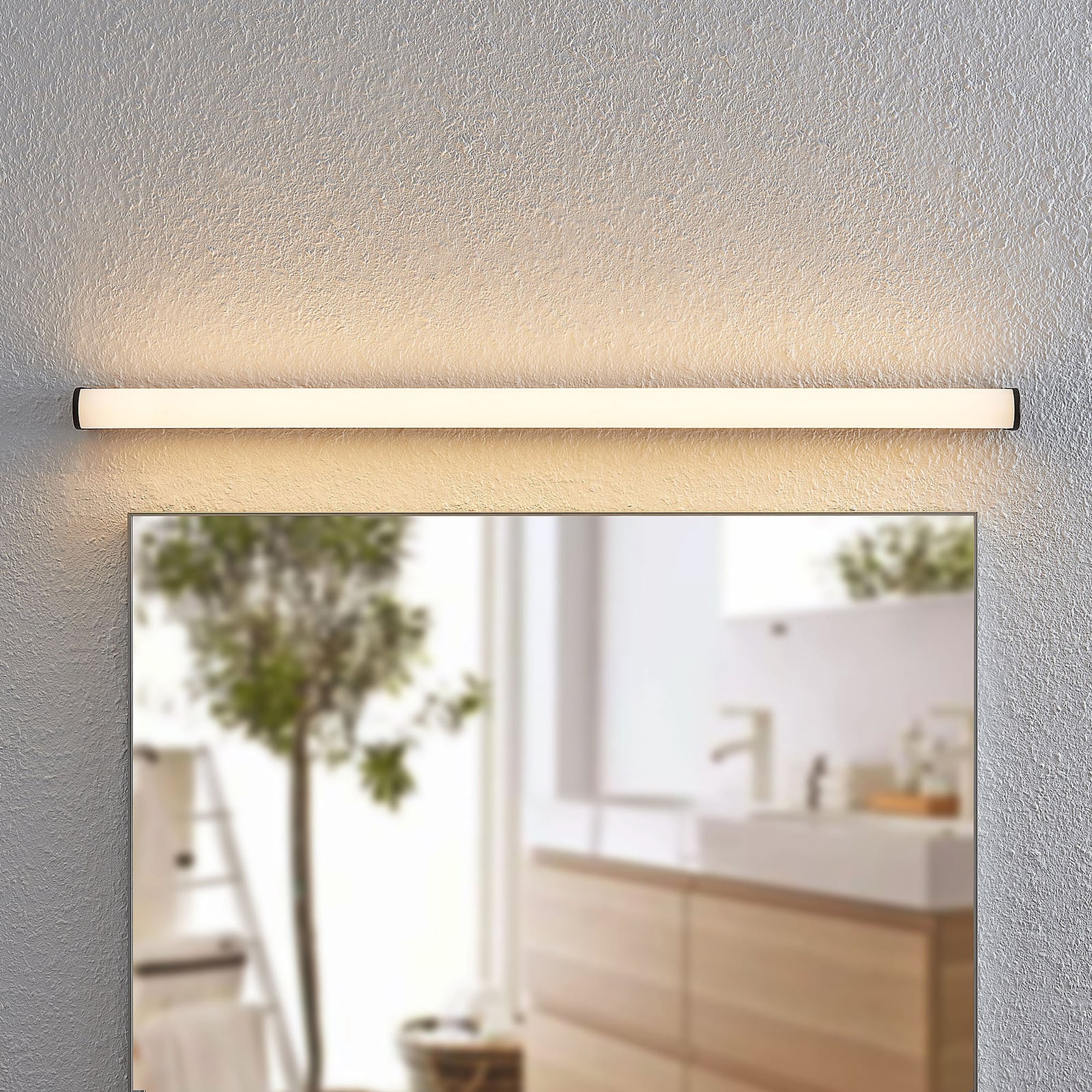 LED baderomsvegglampe Ulisan montert på bad