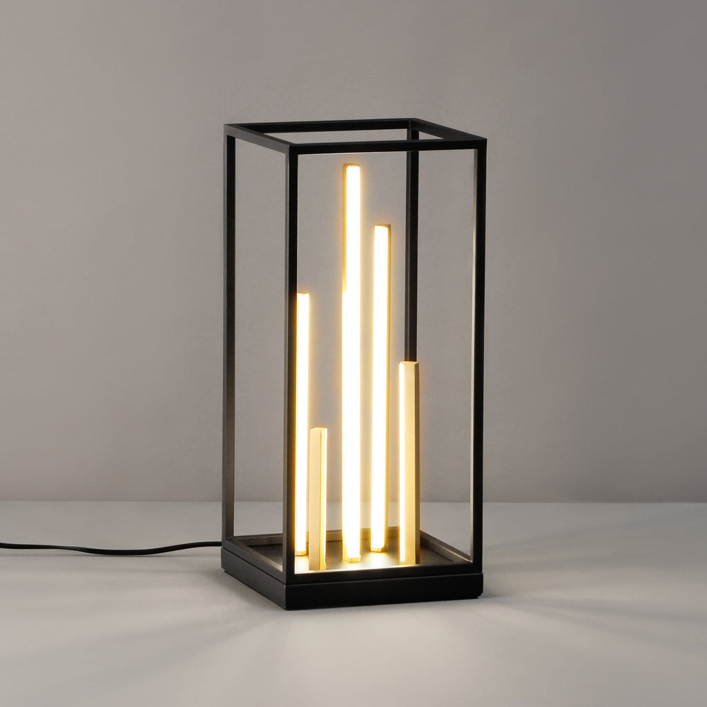 Detalj av LED bordlampe Grid svart/gull metall CCT dimbar