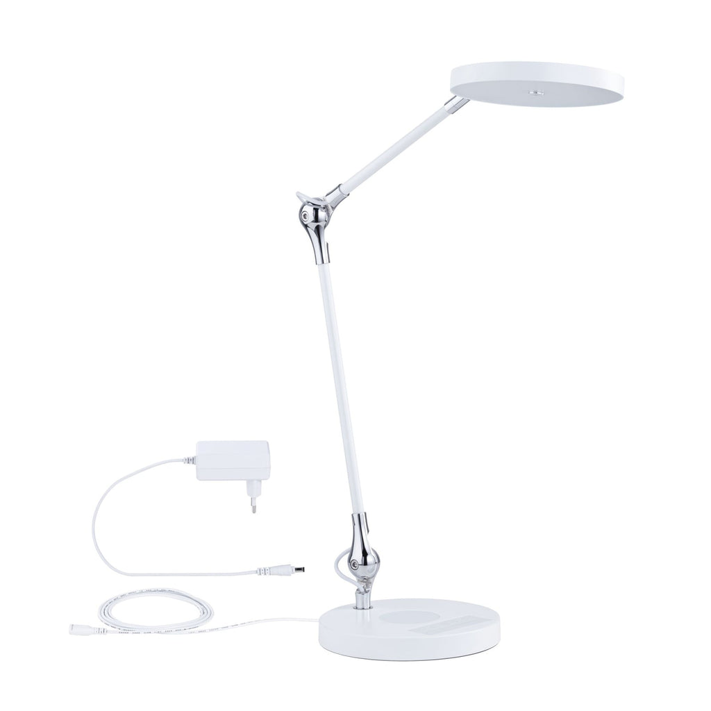LED bordlampe Numis dimbar CCT med Qi-lading hvit med mobil på ladestasjon