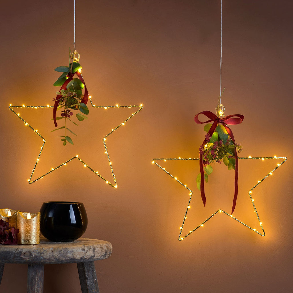 Detalj av LED-dekorstjerne Liva Star gull Ø30 cm
