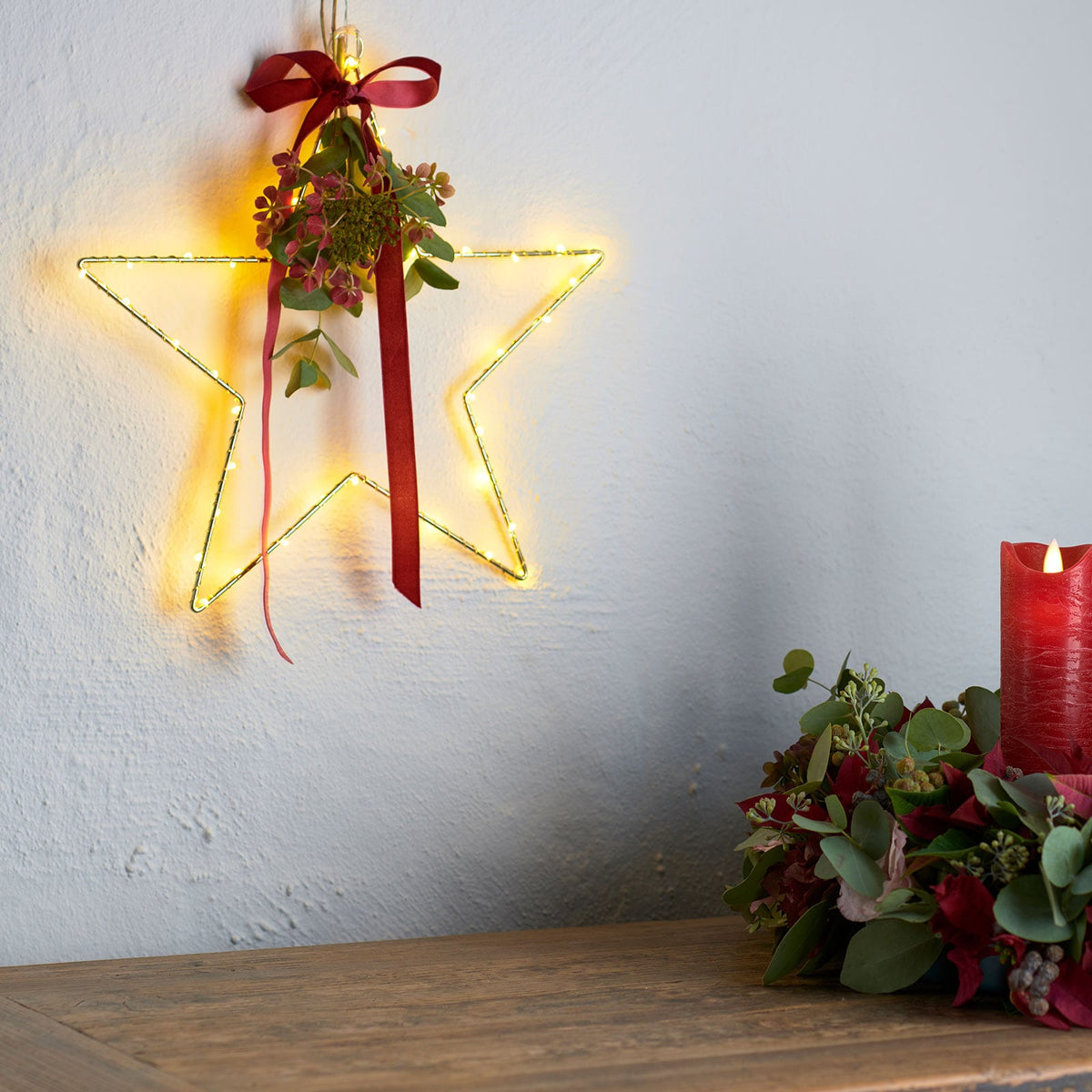 Nærbilde av LED-lys i Liva Star gull Ø30 cm