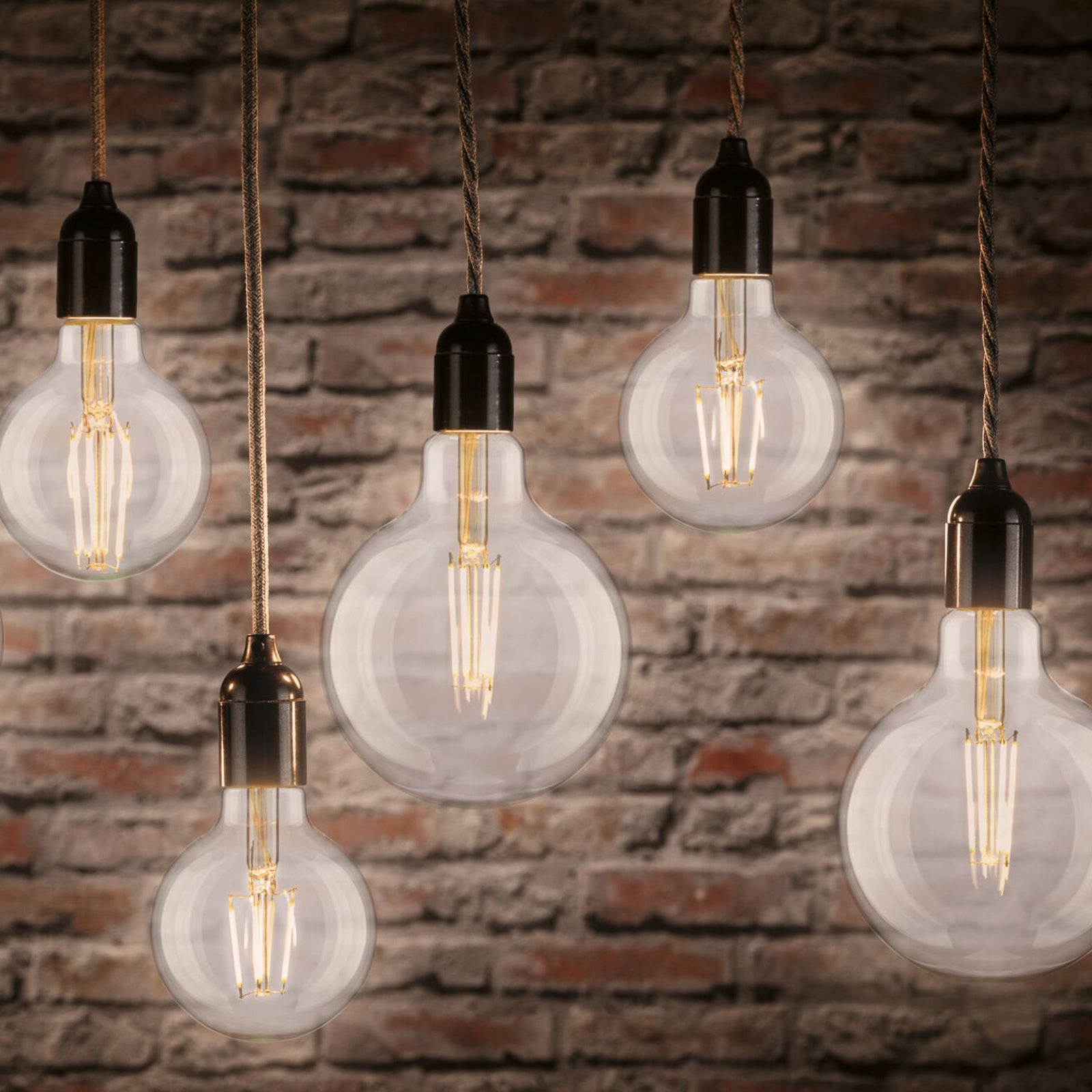LED filamentpære G125 E27 9W 2700K 1055 lm klar Pauleen montert