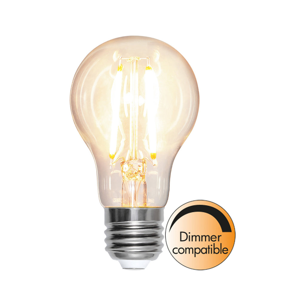 LED filamentpære E27 8W 2700K 1000 lm dimbar klar pæreform montert