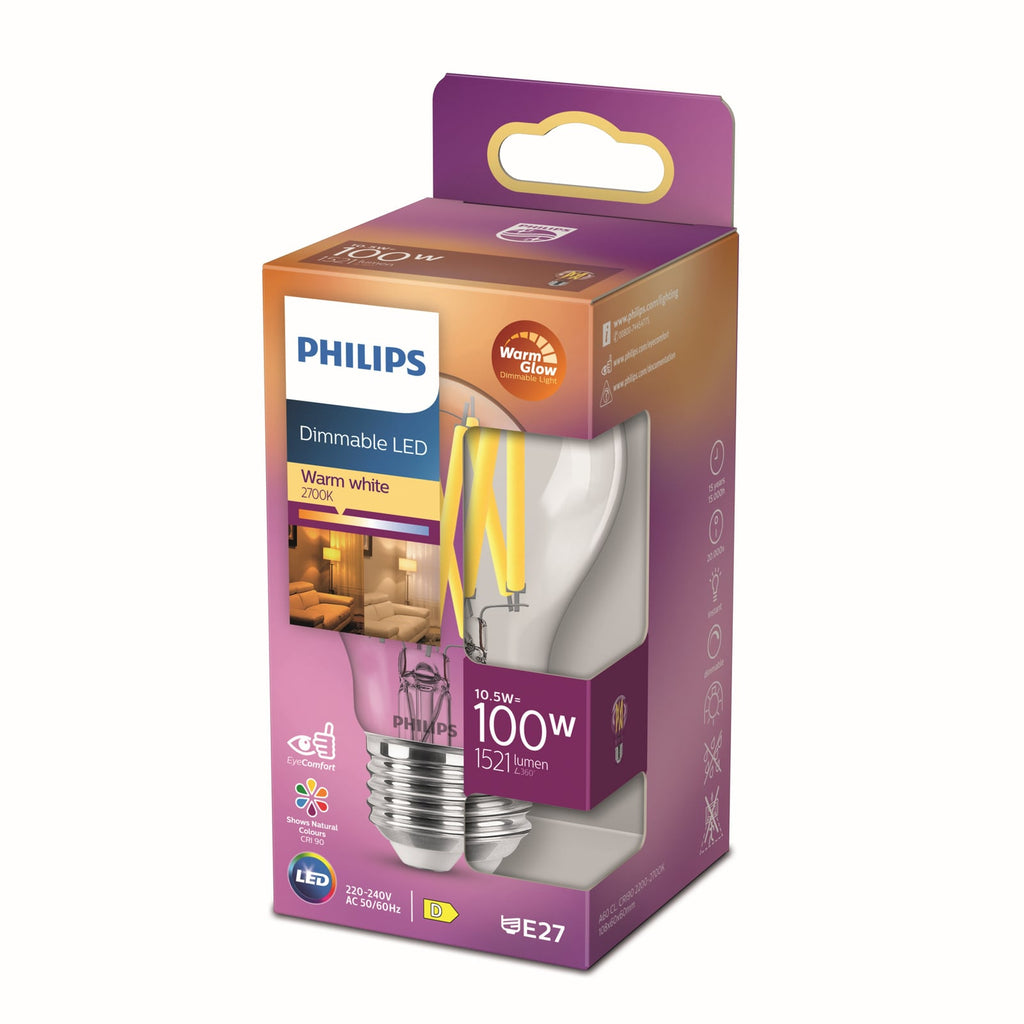 Nærbilde av LED filamentpære E27 A60 klar 10,5W WarmGlow dimbar Philips