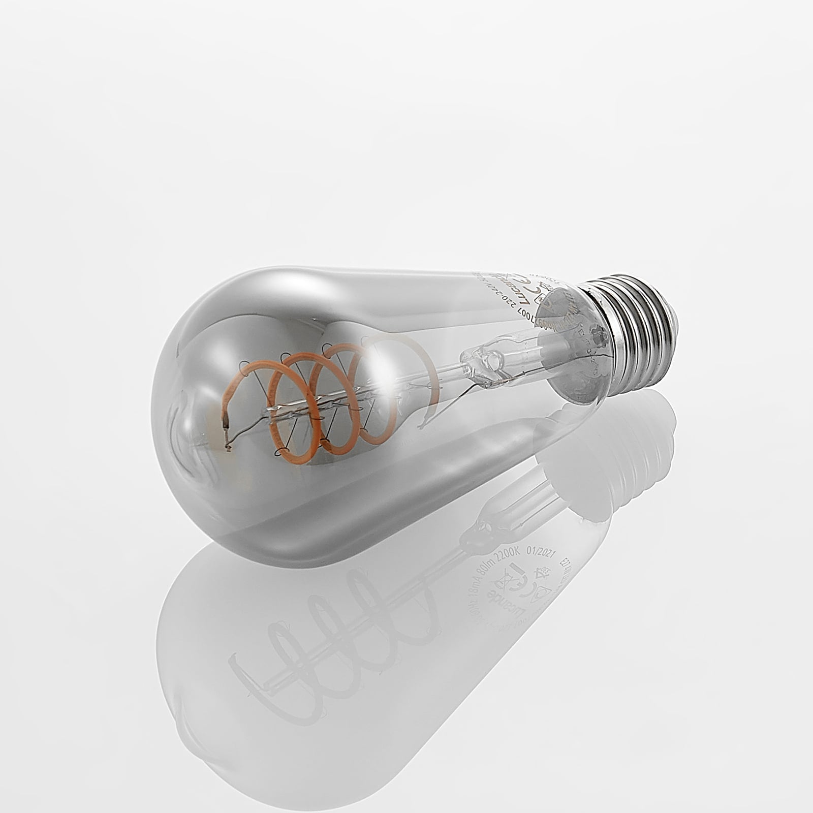 Nærbilde av filament i LED filamentpære E27 ST64 4W røykfarget 1800K dimbar - Lucande