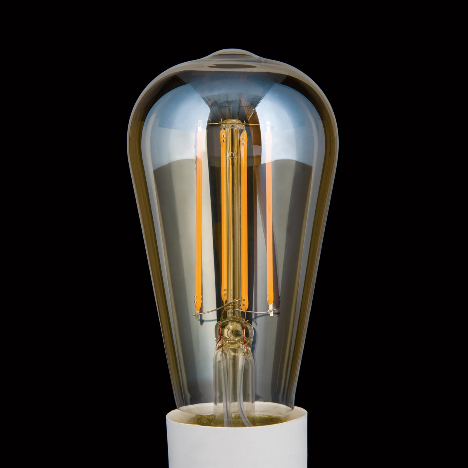 Detalj av LED filamentpære E27 ST64 6W amber dimbar 2200K - ORION