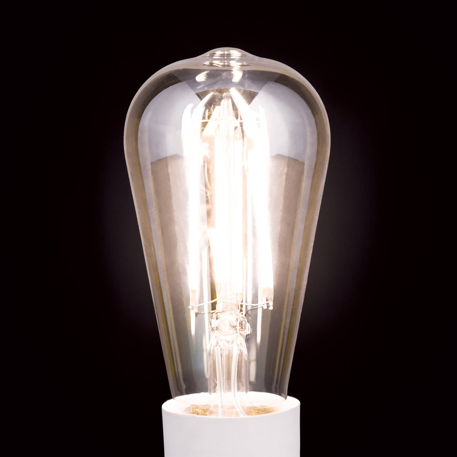 Montert LED filamentpære E27 ST64 6W amber dimbar 2200K - ORION i lampe