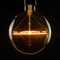 LED globepære G150 E27 5W dimbar klar 2200K Ø15 cm - SEGULA forfra