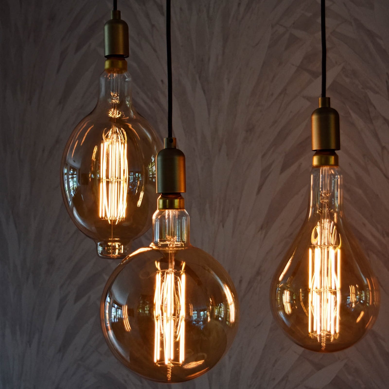 LED globepære Megaglobe G200 E27 10,5W 1100lm dimbar gull sidet