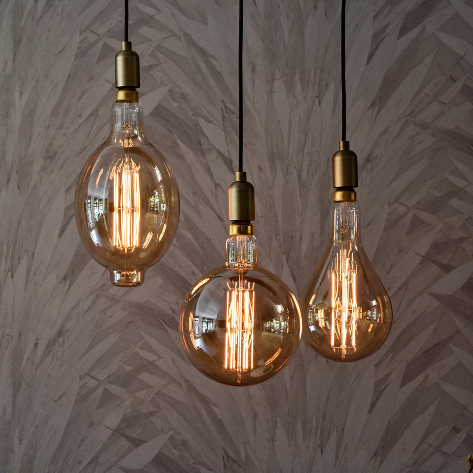LED globepære Megaglobe G200 E27 10,5W 1100lm dimbar gull med synlige filamenter