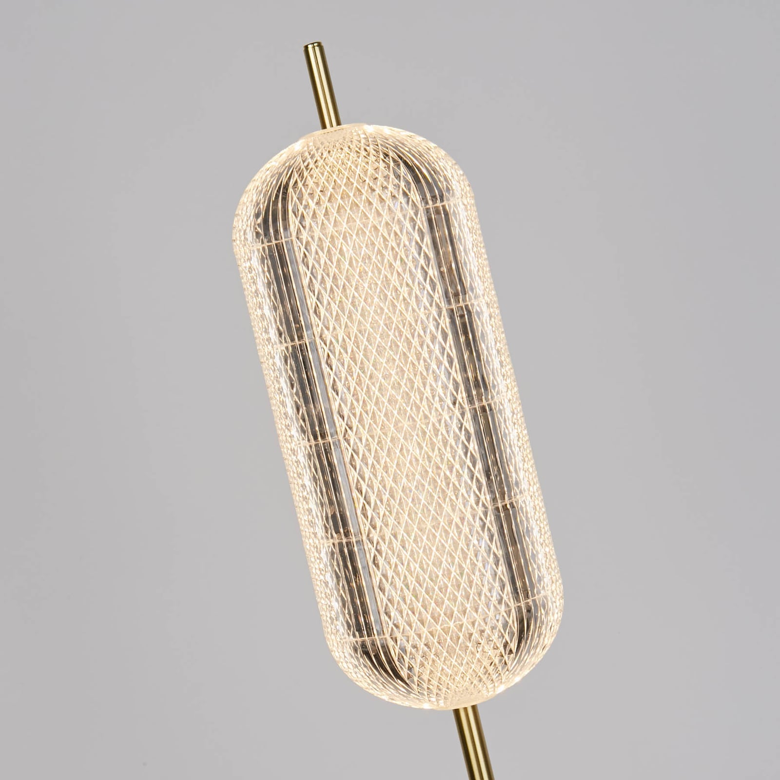 LED-gulvlampe Capsule messingfarget akryl dimbar 154 cm nærbilde av fotbryter