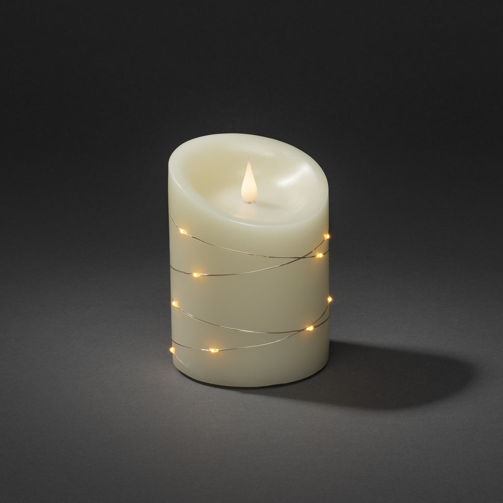 Detalj av LED-kubbelys ekte voks krem ravfarget lys h. 14 cm
