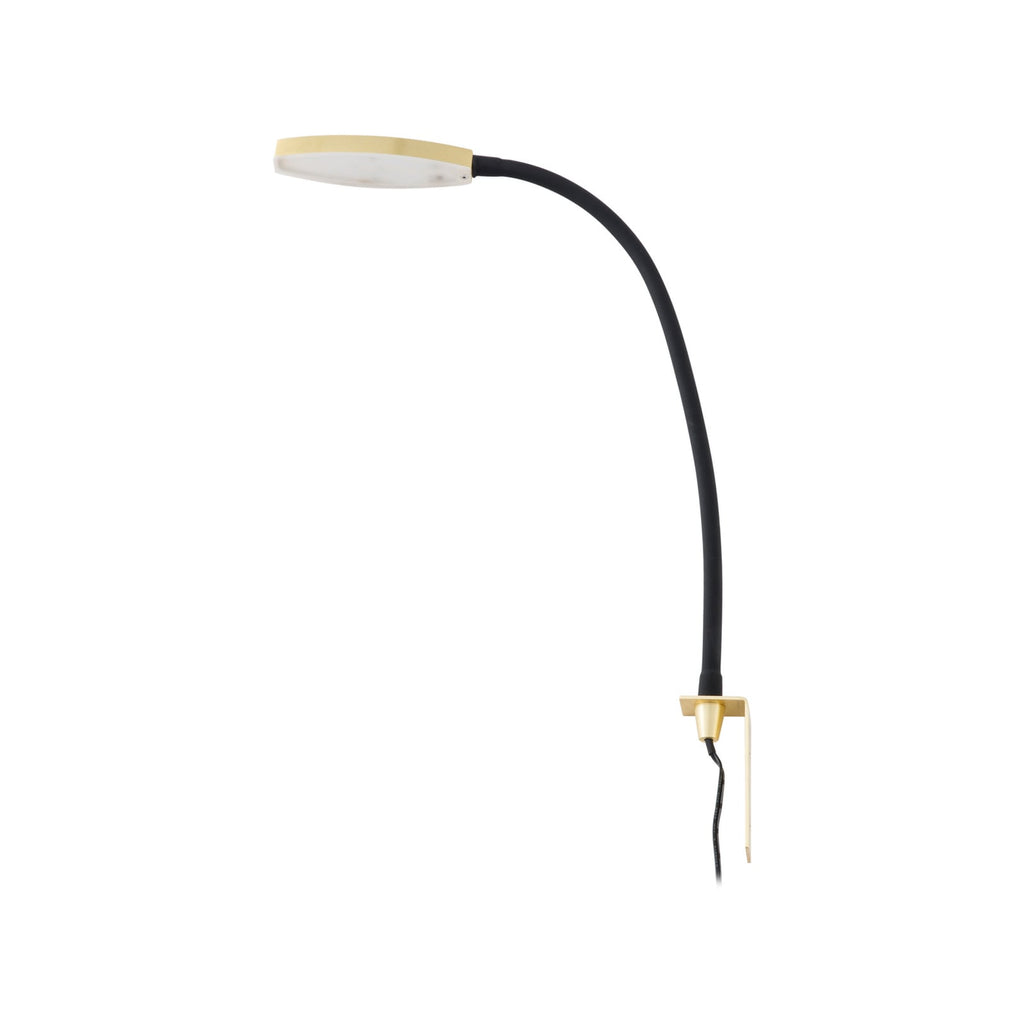 Detalj av fleksarm på LED leselampe Flexola messing/svart