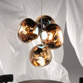 LED-lysekrone Melt Chandelier dimbar gull Ø98 cm forfra
