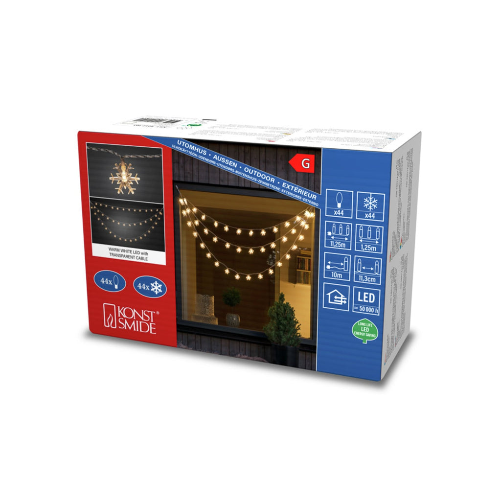 LED-lysgardin snøfnugg 44 LED varmhvit 125 cm - Konstsmide nærbilde av snøfnuggdesign