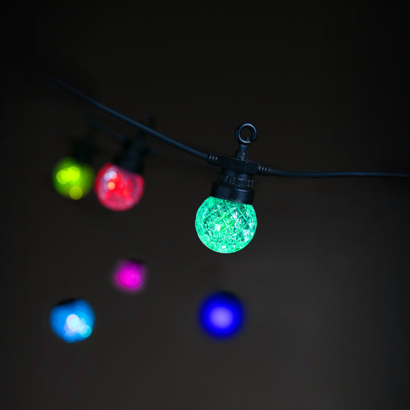 Bakside av LED-lyslenke 25x globe fasettert 12 m RGB IP65 Lite Bulb Moments