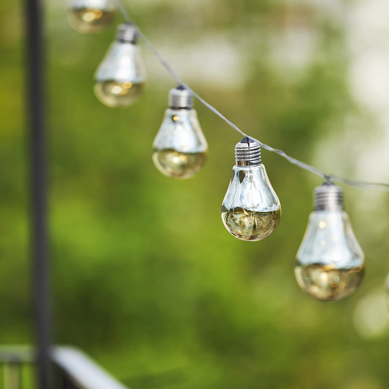 LED-lyslenke Glow 10 lys røykgrå glass forfra