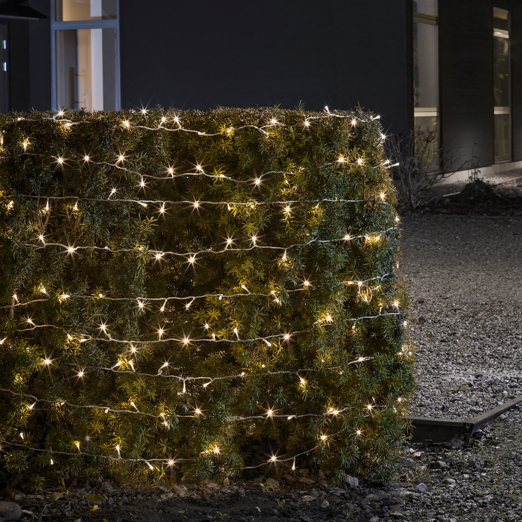 LED lyslenke utendørs 20-lys med skumringssensor IP44 - Konstsmide Christmas montert utendørs