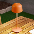 LED oppladbar bordlampe Arietty oransje IP65 dimbar forfra
