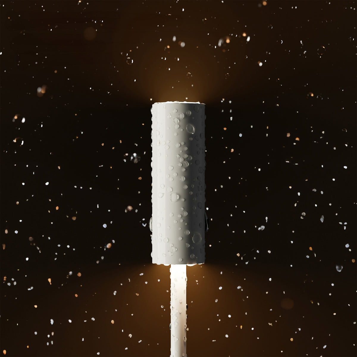 Nærbilde av touchbryter på LED oppladbar bordlampe Nucandle svart/kobber