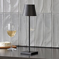 LED oppladbar bordlampe Nuindie svart IP54 dimbar 38 cm forfra