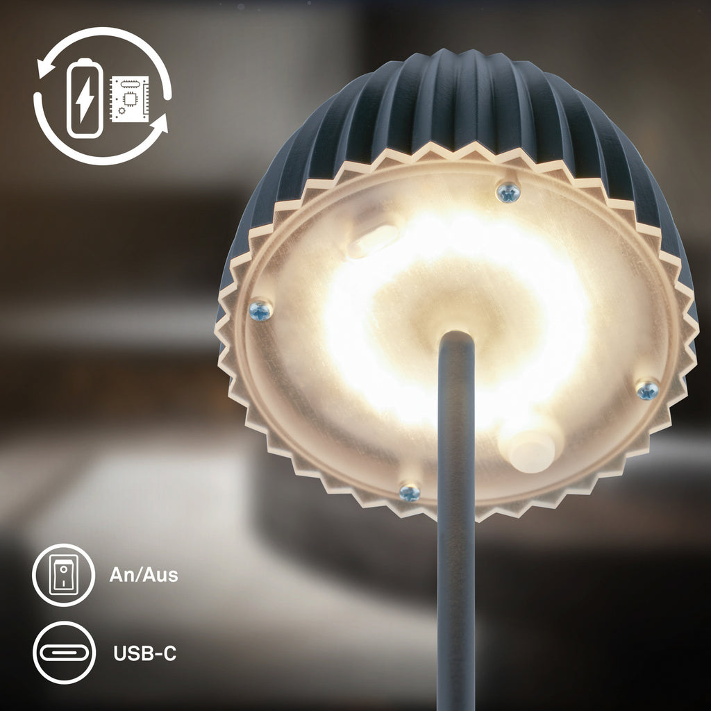 LED oppladbar bordlampe Riffle antrasitt lys i mørkt rom