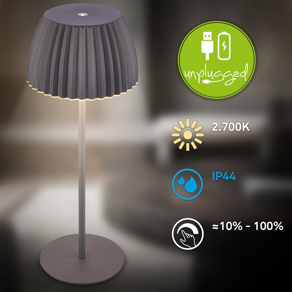 LED oppladbar bordlampe Riffle antrasitt i bruk på balkong