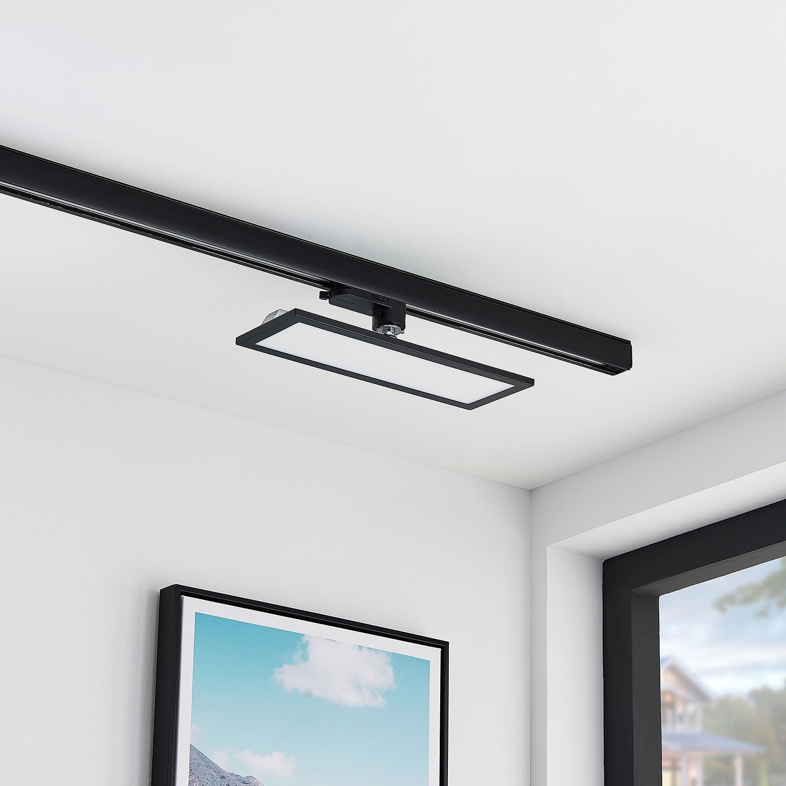 Detalj av LED-panel Hairis svart 3-fase skinne 30 cm