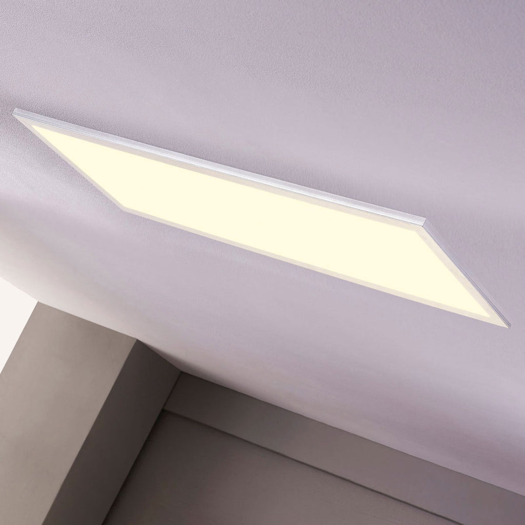 Nærbilde av fjernkontroll til LED-panel Livel dimbar CCT 120x30 cm