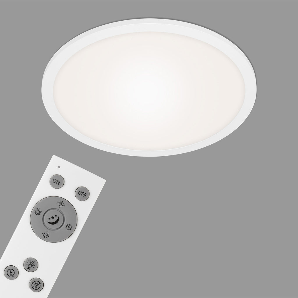 LED-panel Piatto CCT dimbar med fjernkontroll med fjernkontroll i bruk