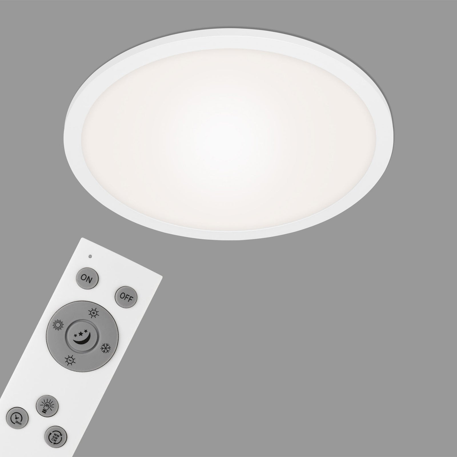 LED-panel Piatto CCT dimbar med fjernkontroll med fjernkontroll i bruk