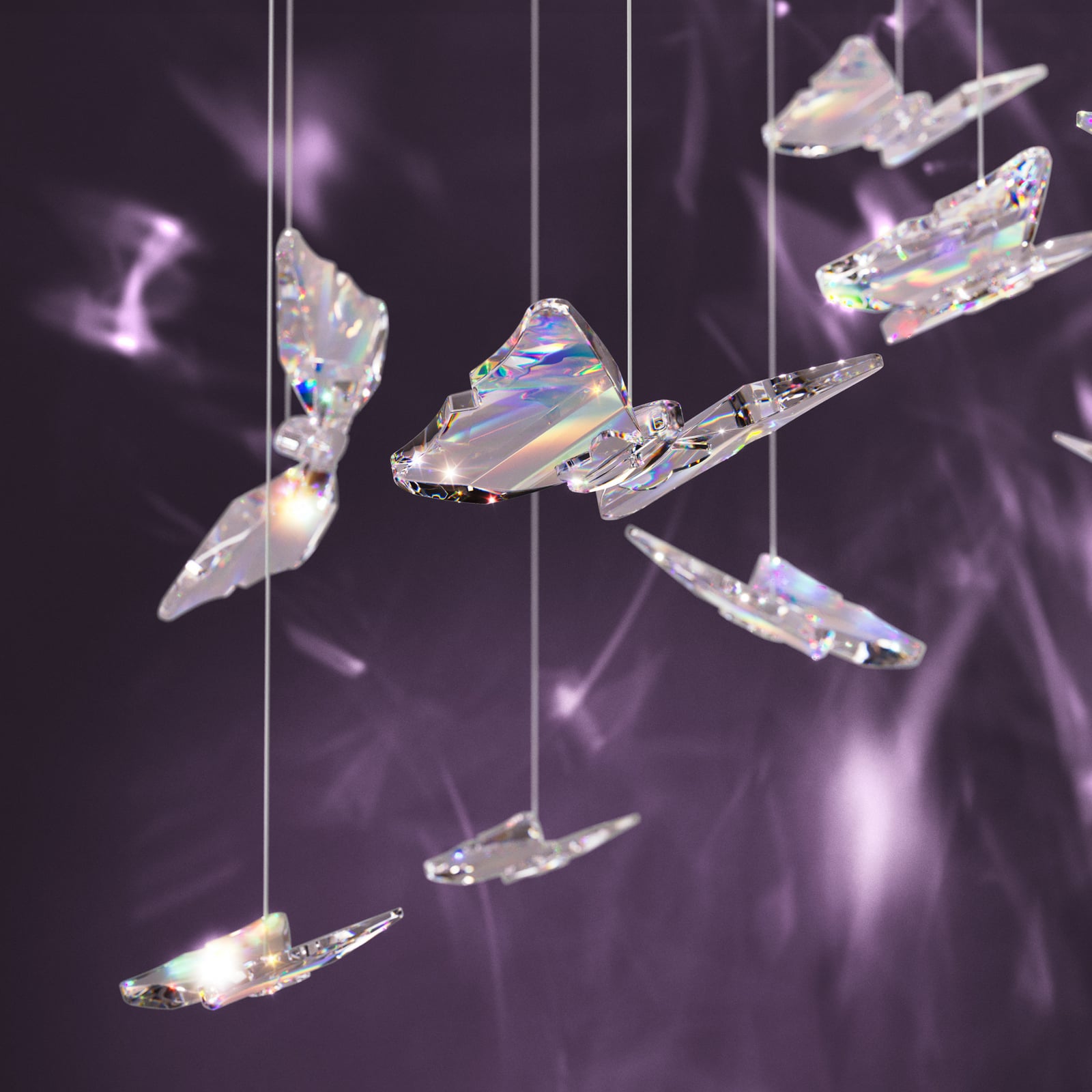 LED pendellampe Adrados 6-lys glass sommerfugler montert i rom