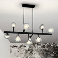 LED pendellampe Altais 9-lys dimbar med fjernkontroll glass forfra