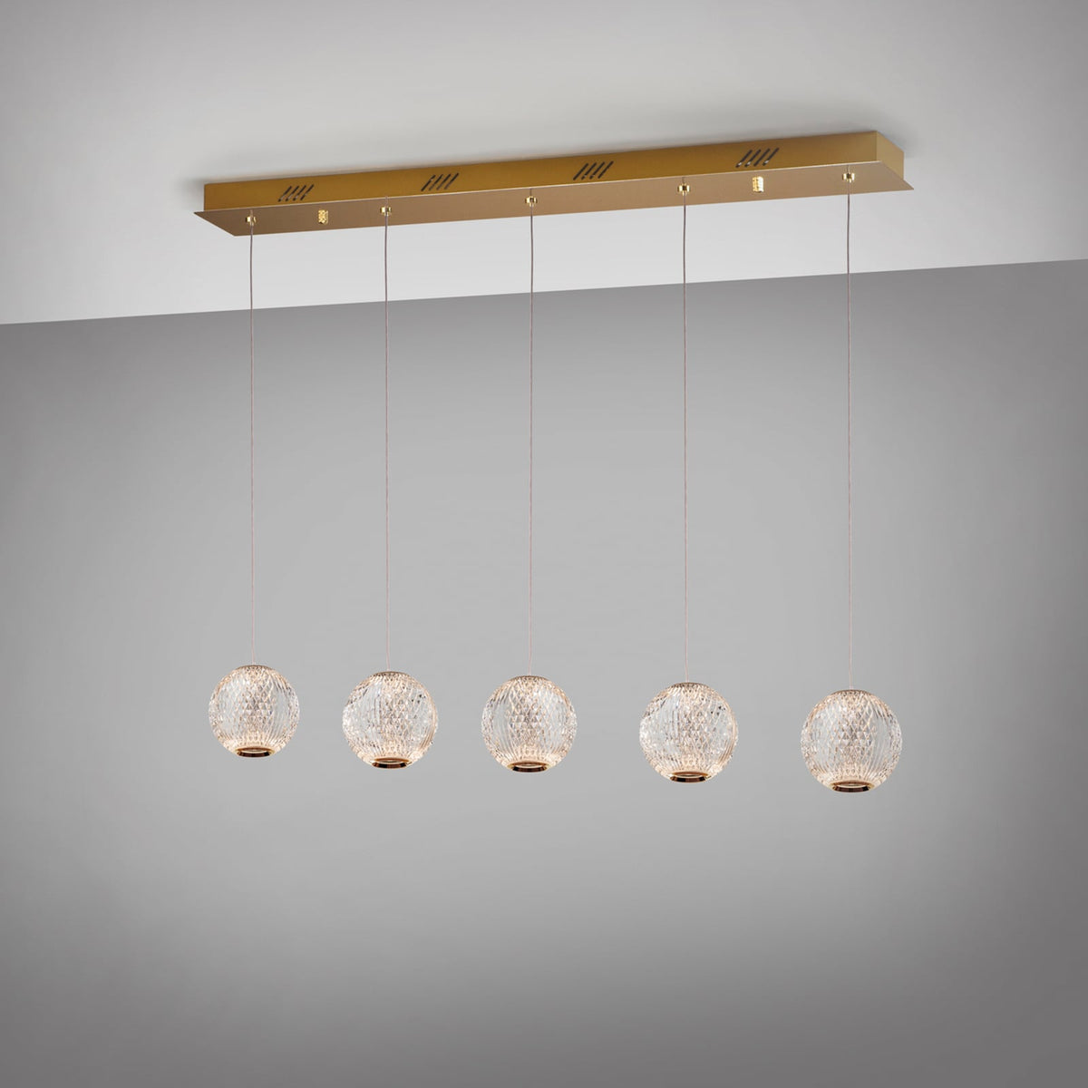 LED pendellampe Austral 5-lys gull/klar montert i rom