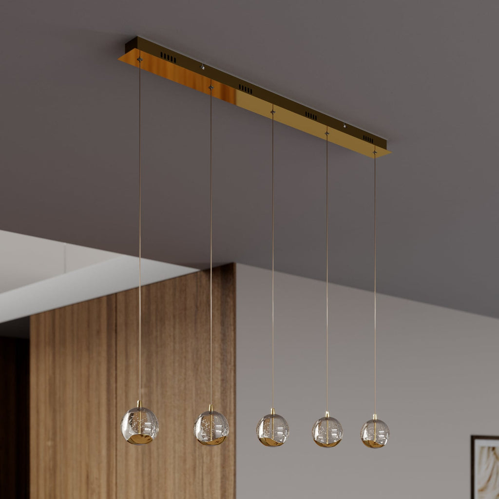 Montert LED pendellampe Hayley 5-lys glass kuleform 96 cm gull i rom