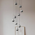 LED pendellampe Hayley 9-lys glass svart forfra