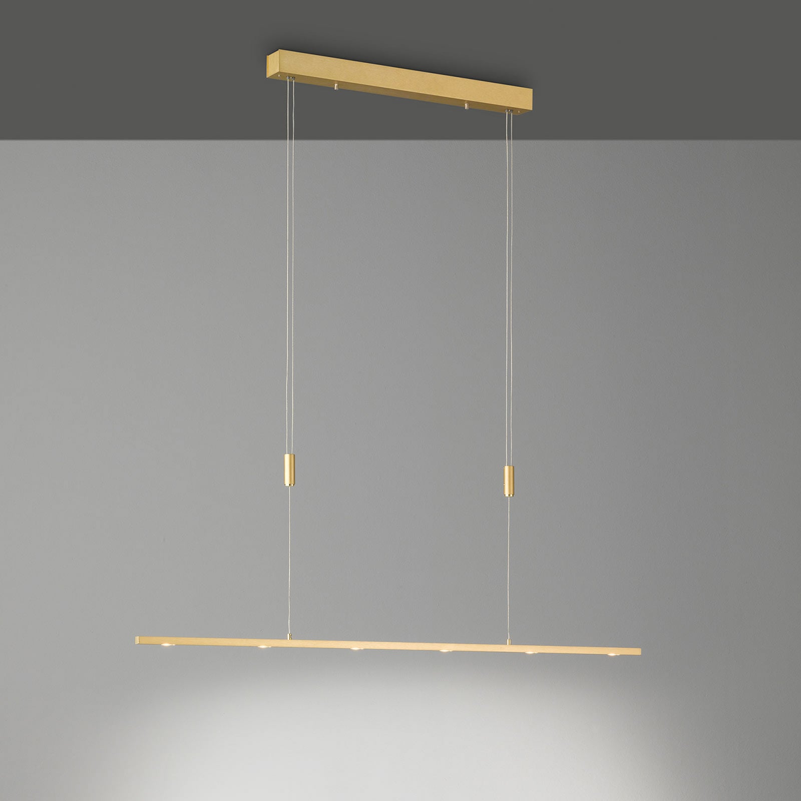 LED pendellampe Tolu dimbar messing 119 cm montert over bord