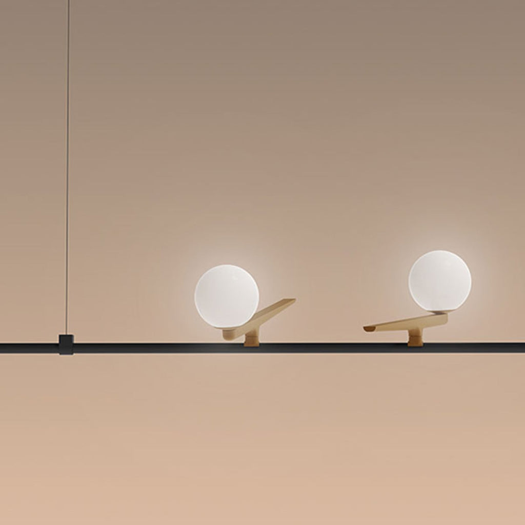 LED pendellampe Yanzi 1 3-lys messing/svart detalj av lysarm