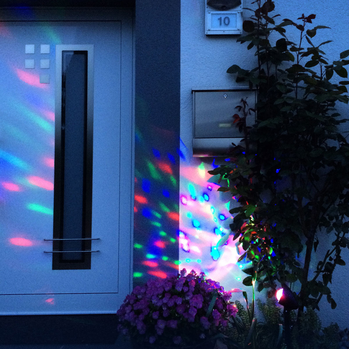 Oversikt av LED-projektor Disco RGB roterende lyseffekt IP44 - Näve i bruk