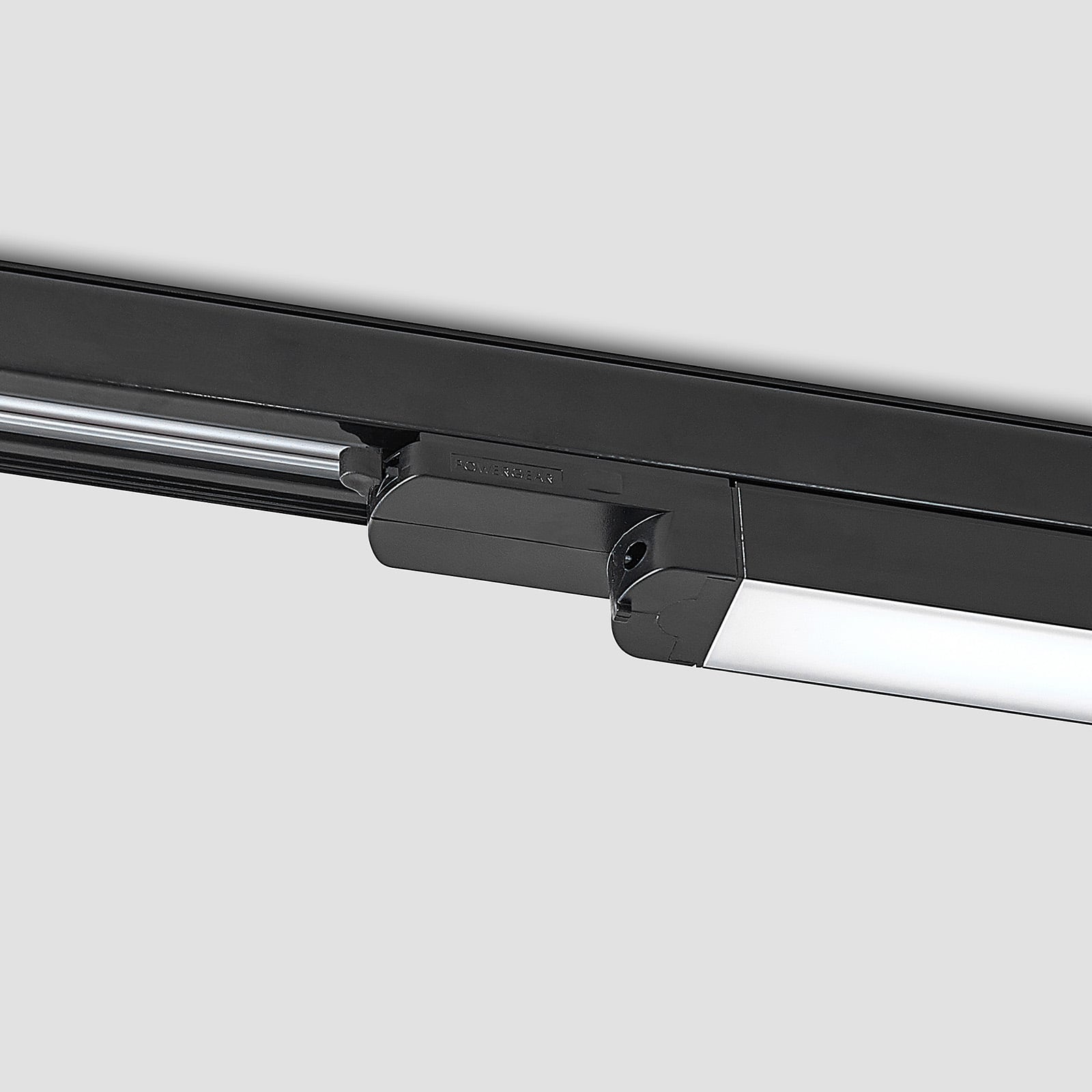 LED-skinnelampe Harlow svart 3-fase 109 cm lys i bruk