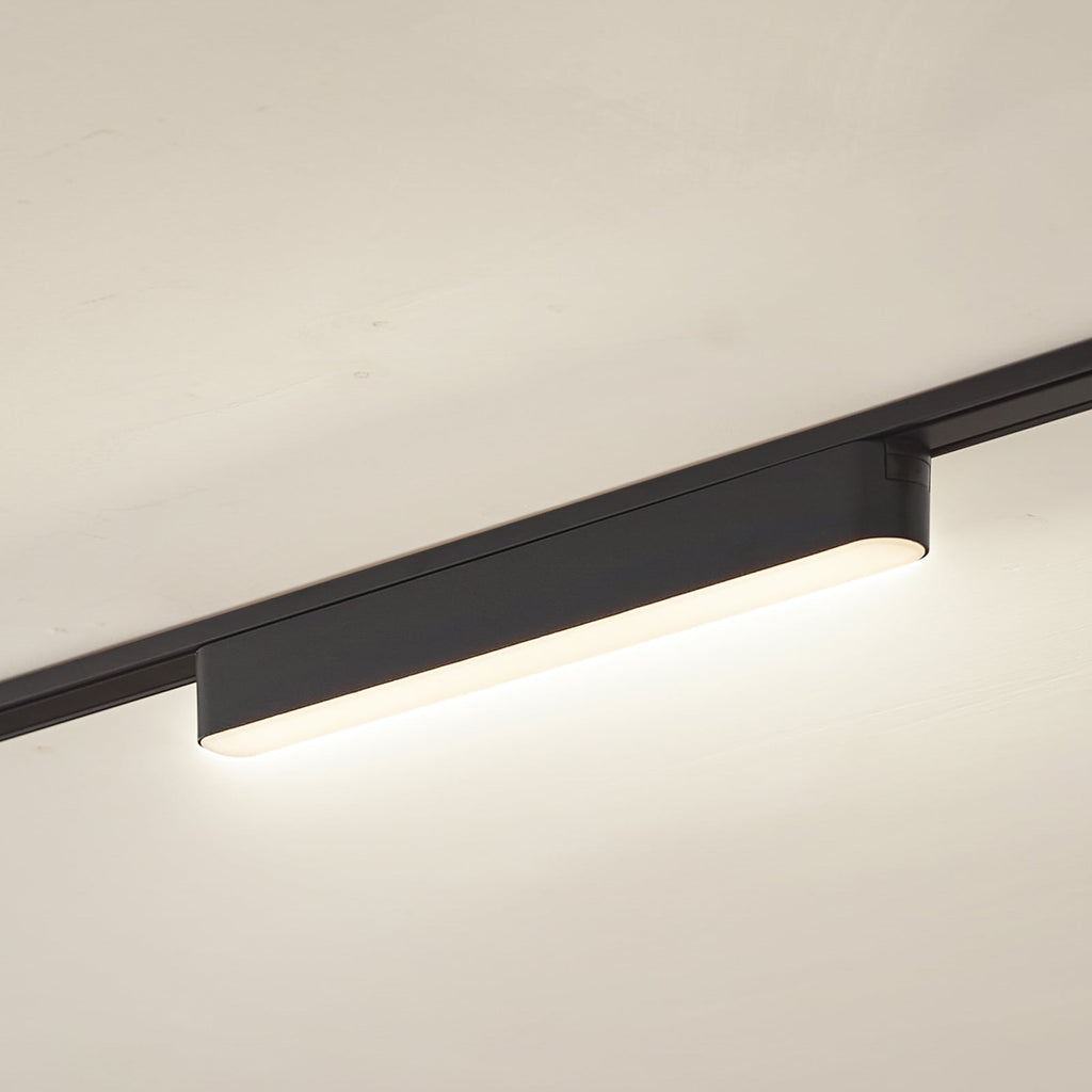 LED-skinnelampe Lumaro 48V svart 10W plast dimbar CCT forfra