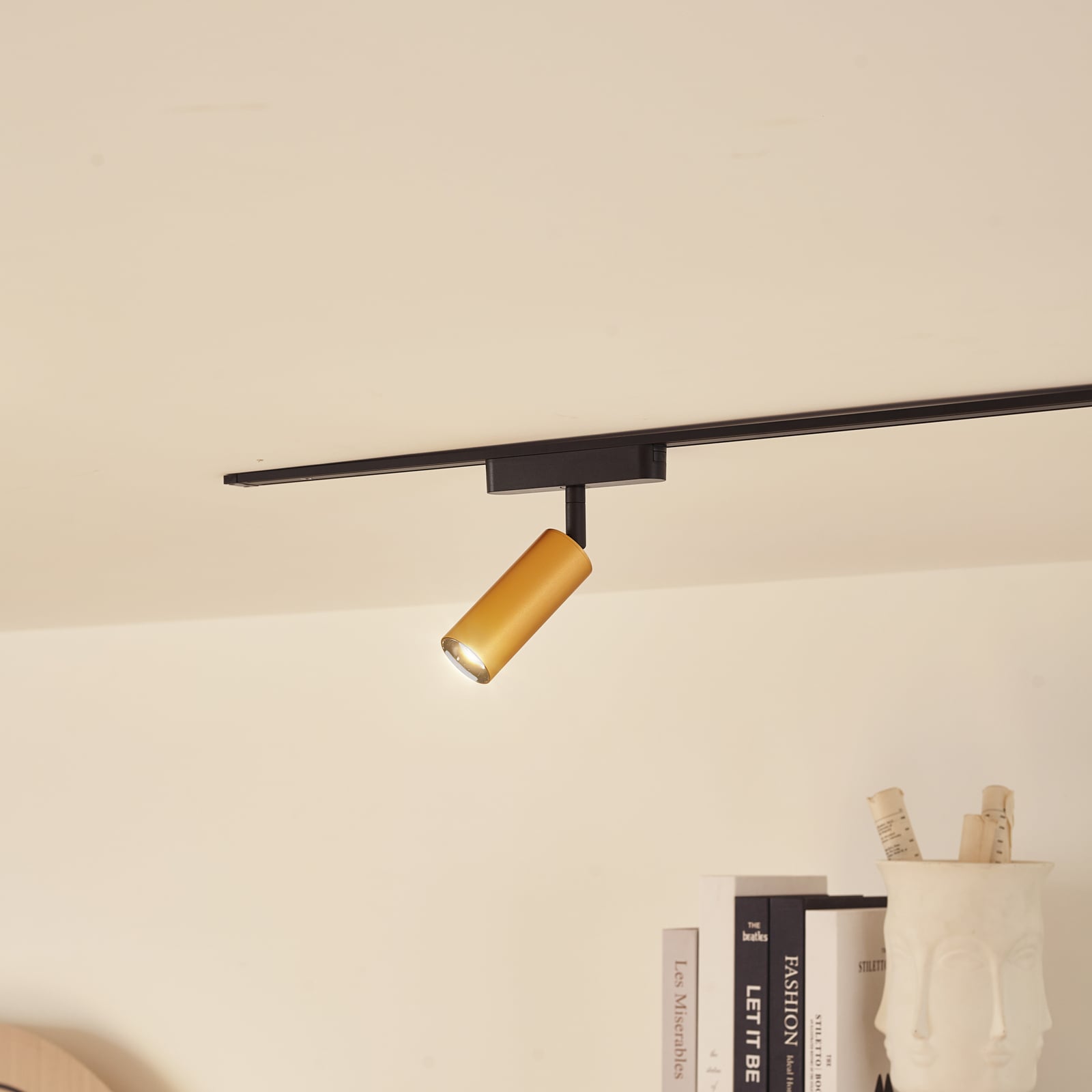 LED-skinnespot Lumaro 48V gull detalj av lampehode