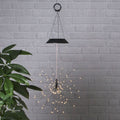 LED solcelle pendellampe Firework Ø26 cm svart IP44 forfra