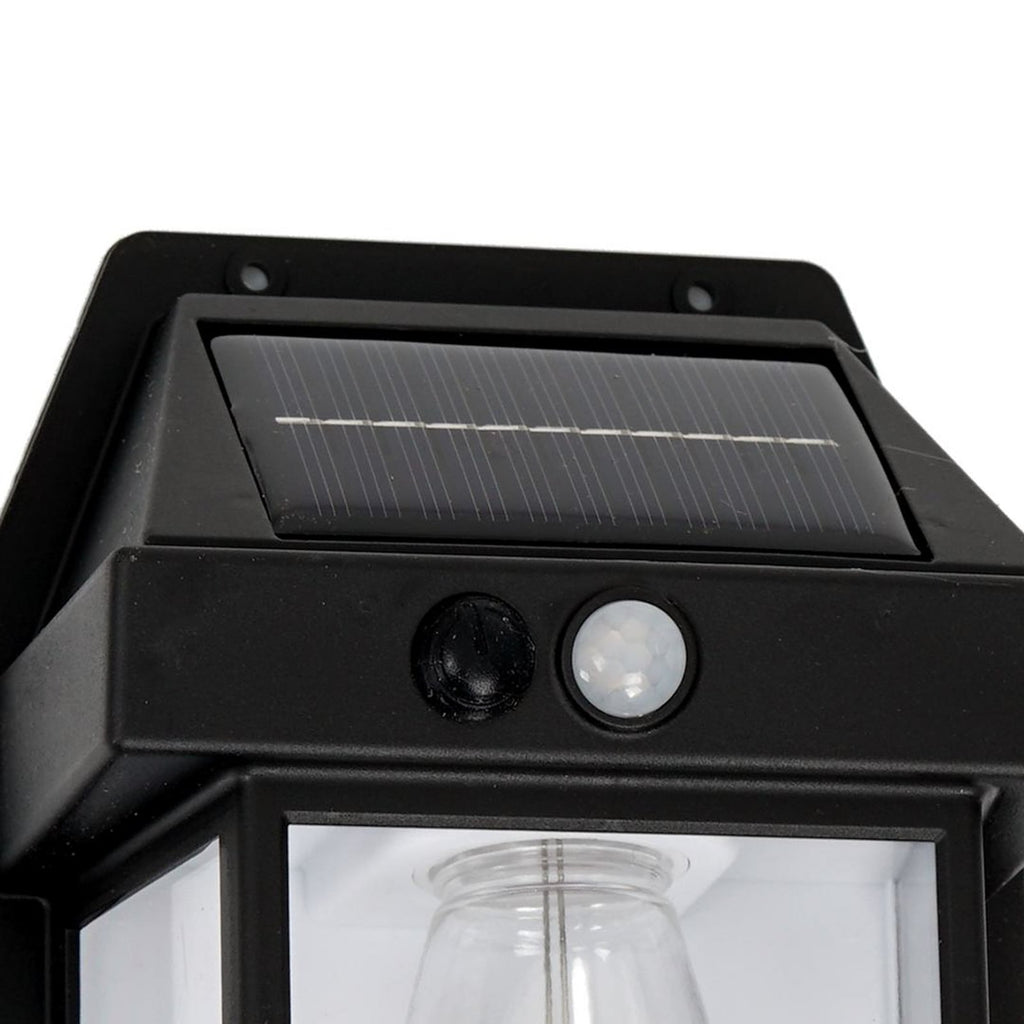 Detalj av LED solcelle utevegglampe Filo med bevegelsessensor svart IP44